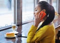 Beautiful mixed race girl talking on the phone