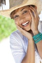 Beautiful Mixed Race Woman Laughing in Cowboy Hat