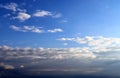 Beautiful mixed white and dark cloud formations on a blue sky Royalty Free Stock Photo