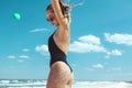 Beautiful model in bikini posing at the beach