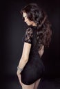 Beautiful Model brunette woman with long curly hair, in dress Royalty Free Stock Photo