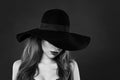 Beautiful model in classic hat, black and white portrait Royalty Free Stock Photo