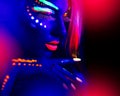 Beautiful model girl with fluorescent make-up