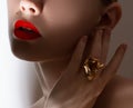 Beautiful model girl with pearl earrings . Fashion makeup and cosmetics . Big earrings and gold ring jewelry . Natural Royalty Free Stock Photo