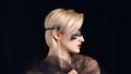 Beautiful Model Wearing A Venetian Masquerade Mask And Red Lipstick - Side View