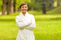 A beautiful model wearing a white toweling robe standing Royalty Free Stock Photo