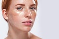 Beautiful model woman with ginger hair and frackles and closeup Royalty Free Stock Photo
