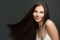 Beautiful model woman with shiny brown and straight long hair. Keratin straightening. Treatment, care and spa procedures Royalty Free Stock Photo