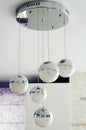 Beautiful modern ball shaped chandelier hanging from the ceiling