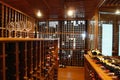 Modern wine storage cellar in a restaurant or house with bottles and corks. Sommelier concept. Royalty Free Stock Photo