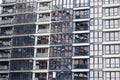 Beautiful modern blue glass fiberglass windows of the facade wall of a modern skyscraper building house. Background, texture Royalty Free Stock Photo