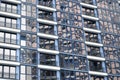 Beautiful modern blue glass fiberglass windows of the facade wall of a modern skyscraper building house. Background, texture Royalty Free Stock Photo