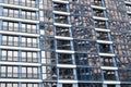 Beautiful modern blue glass fiberglass windows of the facade wall of a modern skyscraper building house. Background, texture Royalty Free Stock Photo