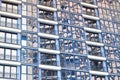 Beautiful modern blue glass fiberglass windows of the facade wall of a modern skyscraper building house. Background, texture Royalty Free Stock Photo