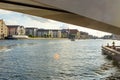 Beautiful modern buildings on the bank of the canal in Copenhagen, Denmark.View from the water, from under the bridge. Royalty Free Stock Photo