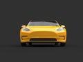 Beautiful modern cadmium yellow electric car - front view closeup shot