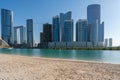 Beautiful modern city surrounded by water | Al Reem island buildings such as Sun and Sky towers in Abu Dhabi city, United Arab Emi Royalty Free Stock Photo