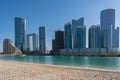 Beautiful modern city surrounded by water | Al Reem island buildings such as Sun and Sky towers in Abu Dhabi city, United Arab Emi Royalty Free Stock Photo