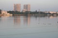 Beautiful modern high rise buildings across the lake are built in Chennai city of India