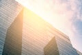 Beautiful modern high-rise glass business building, geometric shape, perspective view, blank space on blue sky and cloudscape, Royalty Free Stock Photo