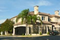 Beautiful modern house and palm trees in city street Royalty Free Stock Photo