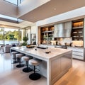 Beautiful Modern Kitchen in a Luxury Home Interior with Large Island and Stainless Steel Appliances Royalty Free Stock Photo