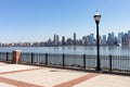 Midtown Manhattan Skyline seen from a Riverfront Park in Weehawken New Jersey Royalty Free Stock Photo