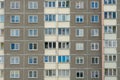 Beautiful modern multi-storey building in a new area of the city. View of the windows of an apartment panel house. An ordinary Royalty Free Stock Photo