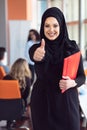 Beautiful modern Muslim businesswoman portrait in office Royalty Free Stock Photo