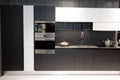 beautiful and modern spacious black kitchen in the recent house Royalty Free Stock Photo