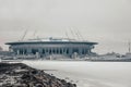 A beautiful modern stadium against the backdrop of a winter river.e.