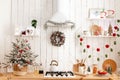 Beautiful modern white kitchen with Christmas decor Royalty Free Stock Photo