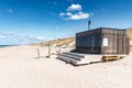 Beautiful modern wooden sauna on a white sandy beach for renting