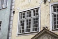 Beautiful modernist windows with more art nouveau in an old building facade in Riga, Latvia