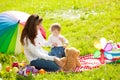 Beautiful Mom and baby outdoors. Happy family playing in nature. Royalty Free Stock Photo