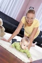 Beautiful mom with her son playing happily. Royalty Free Stock Photo