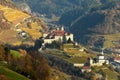 The Beautiful Monastery of Sabiona near Chiusa & x28;Klausen& x29; surrounded by its yellow vineyards. Valle Isarco, Bolzano.