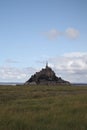 Beautiful Mont Saint Michel cathedral on the island, Normandy, Northern France, Europe. with livestock of sheeps. View at the Mont Royalty Free Stock Photo