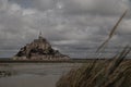 Beautiful Mont Saint Michel cathedral on the island, Normandy, Northern France, Europe. with livestock of sheeps. View at the Mont Royalty Free Stock Photo