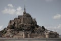 Beautiful Mont Saint Michel cathedral on the island, Normandy, Northern France, Europe. with livestock of sheeps. View at the Mont Royalty Free Stock Photo