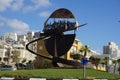 Beautiful monument in an urban city under a cloudy blue sky