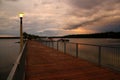 Beautiful moody evening: Lantern on a landing stage - idyllic lake in canada Royalty Free Stock Photo