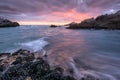 A beautiful moody golden seascape taken on a stormy cloudy evening after sunset Royalty Free Stock Photo