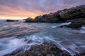 A beautiful moody golden seascape taken on a stormy cloudy evening after sunset Royalty Free Stock Photo