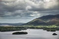 Beautiful moody landscape image of view from Surprise View viewpoint in the Lake District overlooking Derwentwater with Skiddaw Royalty Free Stock Photo