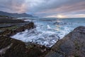 A beautiful moody seascape taken on a stormy cloudy morning at sunrise Royalty Free Stock Photo