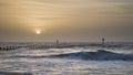 Beautiful dramatic stormy landscape image of waves crashing onto