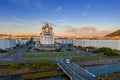 Beautiful morning cityscape. Cathedral and buildings at sunrise