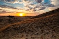 Beautiful morning desert landscape at sunrise with dunes