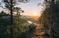 Beautiful morning landscape, first sun rays appears over mountains and river valley, Usva, Ural mountains.